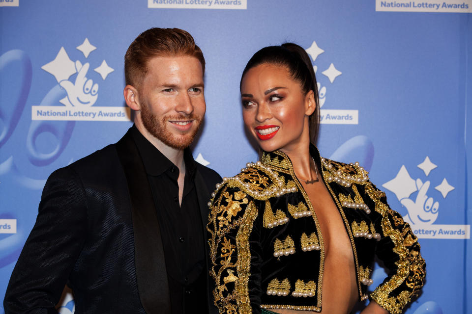 Dancers Neil and Katya Jones  pose for photographers upon arrival at the National Lottery Awards, in central London, Friday, Sept. 9, 2016. (Photo by Grant Pollard/Invision/AP)