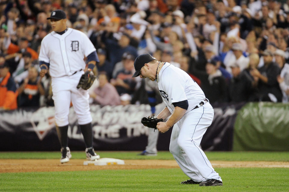 DETROIT, MI - OCTOBER 13: Phil Coke #40 of the Detroit Tigers reacts after the final out of Game Five of the American League Championship Series at Comerica Park on October 13, 2011 in Detroit, Michigan. The Tigers defeated the Texas Rangers 7-5. (Photo by Harry How/Getty Images)