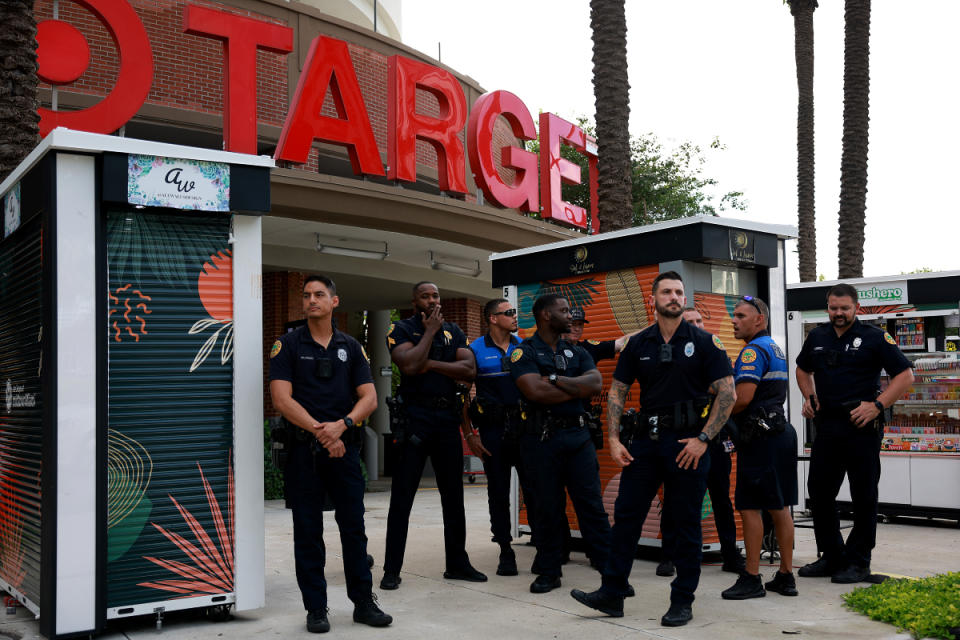 City of Miami police officers keep an eye on protesters outside of a Target store on June 1, 2023 in Miami. The protesters were reacting to Pride Month merchandise featuring the rainbow flag in support of the rights of the lesbian, gay, bisexual, transgender, and queer communities that had been sold at Target stores. Target removed certain items from its stores and made other changes to its LGBTQ+ merchandise after a backlash from some customers.