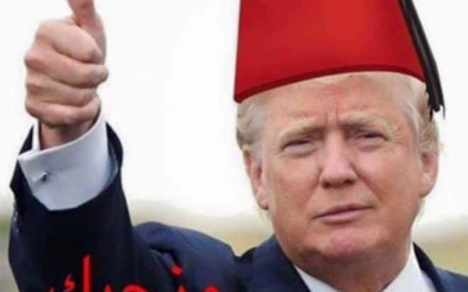 The US president is shown wearing a hat similar to a fez with the words: