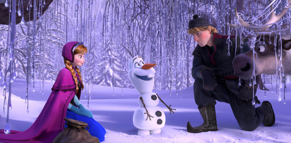 This image released by Disney shows, from left, Anna, voiced by Kristen Bell, Olaf, voiced by Josh Gad, and Kristoff, voiced by Jonathan Groff in a scene from the animated feature "Frozen." "Frozen's" grip on the domestic box office is heading for a meltdown as the combat docudrama "Lone Survivor" threatens a firefight for the top spot with an expected gross of $15 million. (AP Photo/Disney)