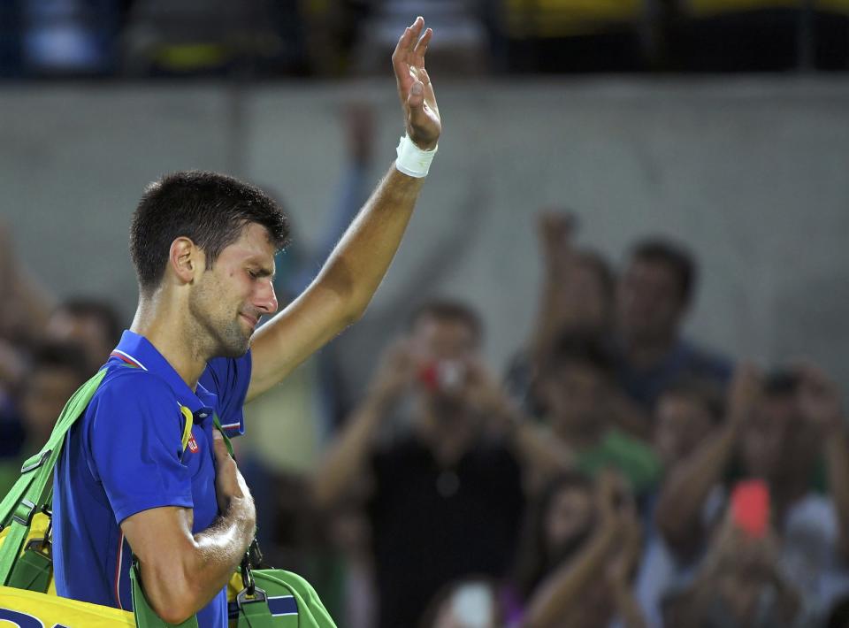 Djokovic almost made it out of the stadium without losing it. Almost. The tears came, and he couldn't stop them. (REUTERS/Toby Melville)