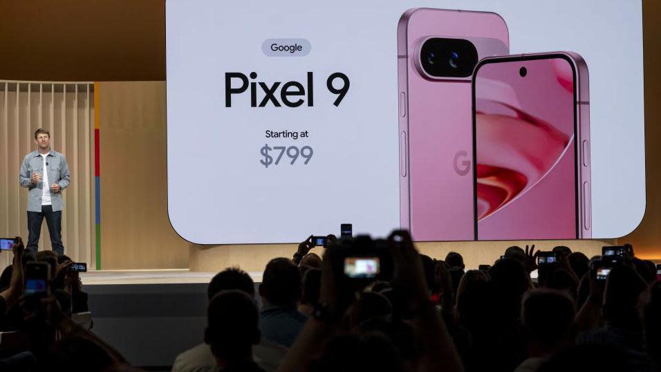 Brian Rakowski, vice president of product management at Pixel, shows off the new Pixel 9 phones.