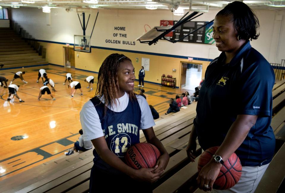 Coach Dee Hardy, right, and her daughter, Alecia Hardy, of the E.E. Smith girls basketball team have a mother-daughter relationship at home and a coach-player relationship on the court. November 17, 2011