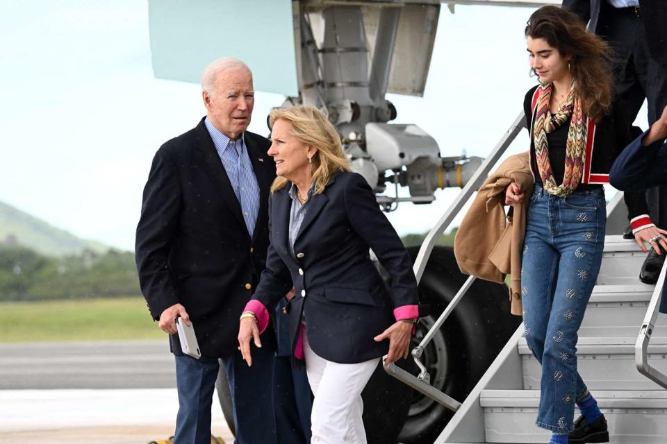 <p>MANDEL NGAN/AFP via Getty</p> President Joe Biden, first lady Jill Biden and their granddaughter Natalie Biden arrive in St. Croix