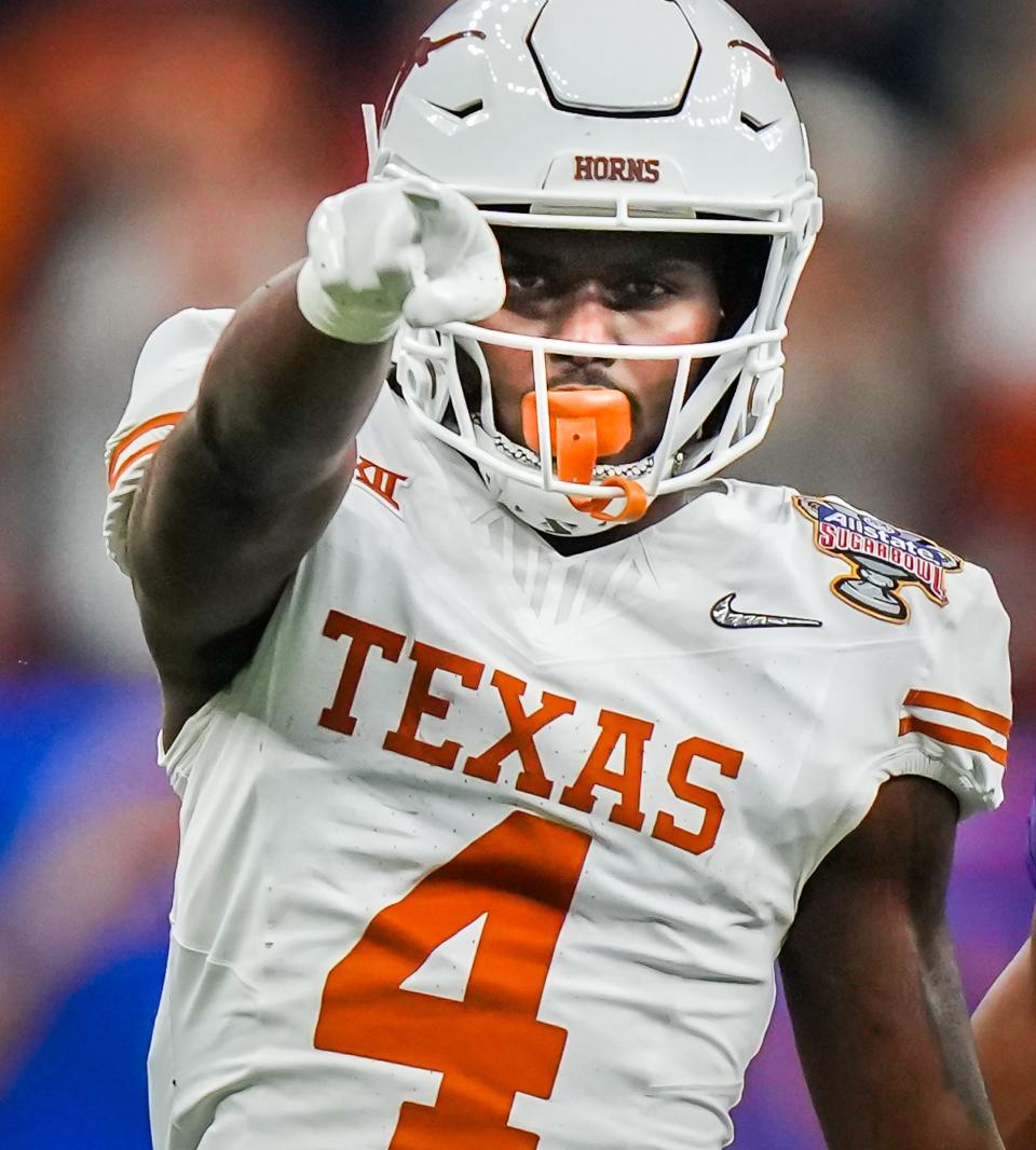 Texas defensive back Austin Jordan points downfield while celebrating a play during the Longhorns' Sugar Bowl loss to Washington. The Longhorns are coming off a 12-2 season and are reloading with transfer portal additions.