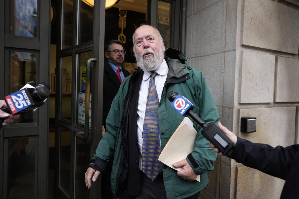 John Amabile, an attorney for Junmyung Lee, walks past microphones as he departs federal court, Wednesday, Nov. 22, 2023, in Worcester, Mass. Two people, Han Lee and Junmyung Lee, accused of operating a high-end brothel network with wealthy and prominent clients in Massachusetts and the Washington, D.C., suburbs, will remain behind bars for now, a judge said on Wednesday. (AP Photo/Steven Senne)