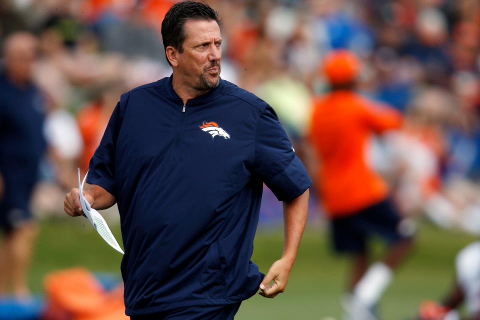 In this Aug. 4, 2016, file photo, Denver Broncos quarterbacks coach Greg Knapp watches during NFL football training camp in Englewood, Colo.