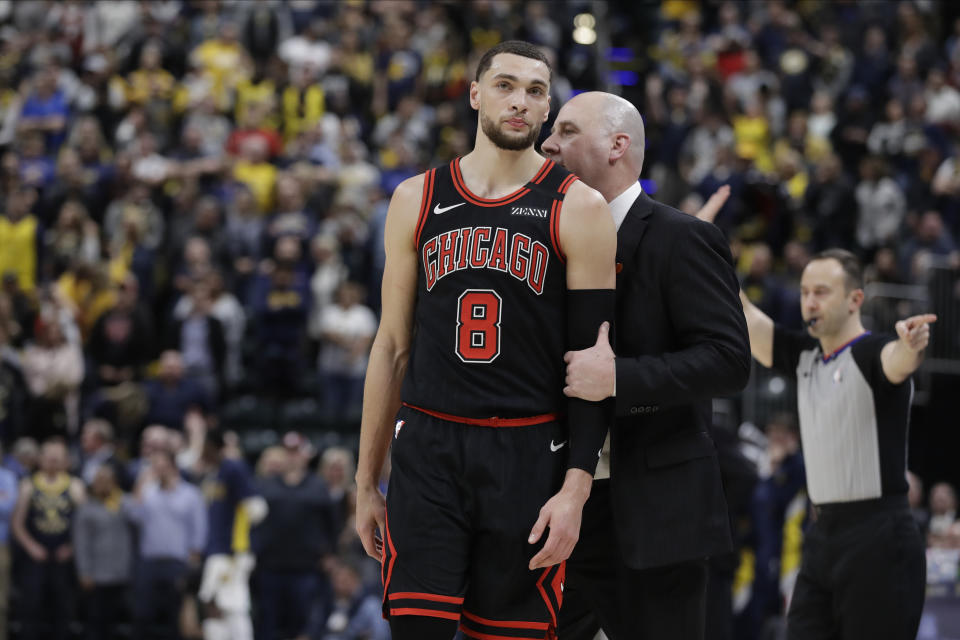 Chicago Bulls coach Jim Boylen talks with Zach LaVine during overtime of their 115-106 loss to the Indiana Pacers on Wednesday, Jan. 29, 2020, in Indianapolis. 