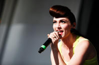 <b>Karmin:</b> "Our thoughts & prayers go out to those involved in the Aurora, CO shooting." (Photo by Brian Ach/Getty Images)