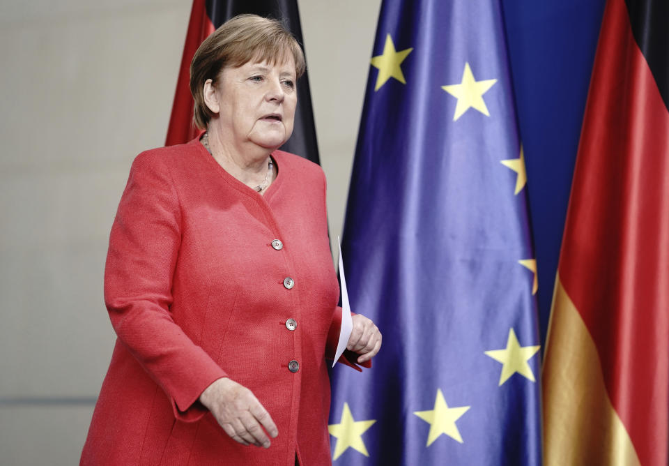German Chancellor Angela Merkel arrives for a press conference in Berlin, Germany, Friday, June 19, 2020 after video meeting with the members of the European Council. (Kay Nietfeld/DPA via AP, Pool)