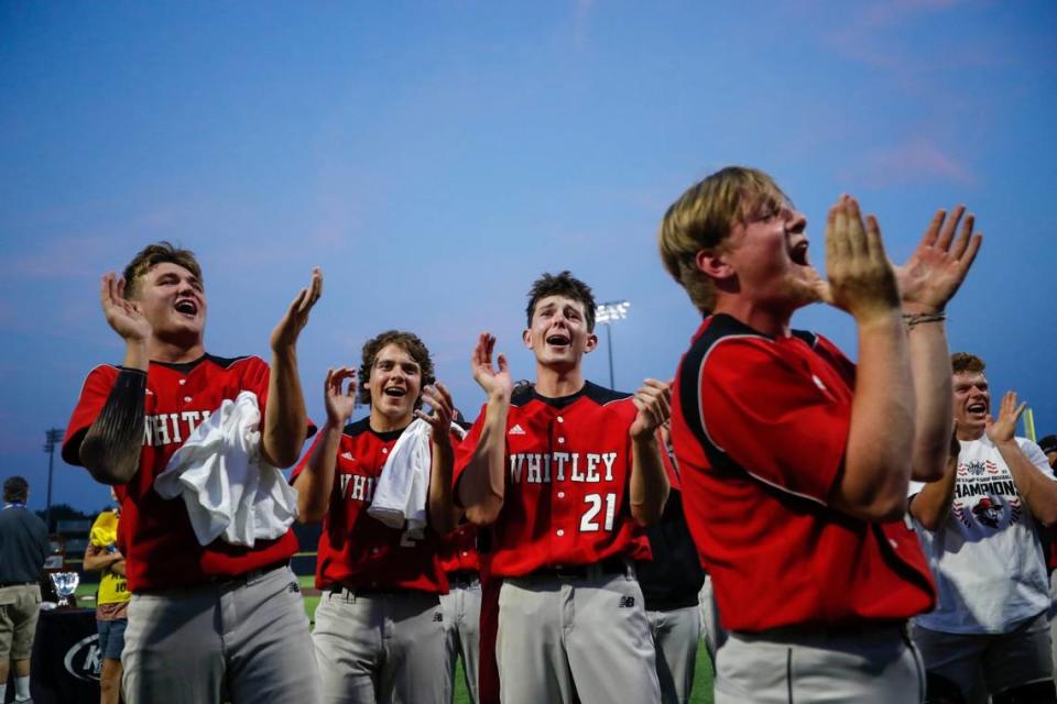 Whitley County’s Grant Zehr (21), the state tournament’s most valuable player, celebrates after the conclusion of Saturday’s win against Shelby County.