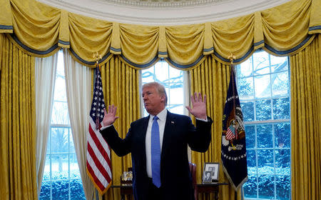 U.S. President Donald Trump speaks during an interview with Reuters at the White House in Washington, U.S., January 17, 2018. REUTERS/Kevin Lamarque