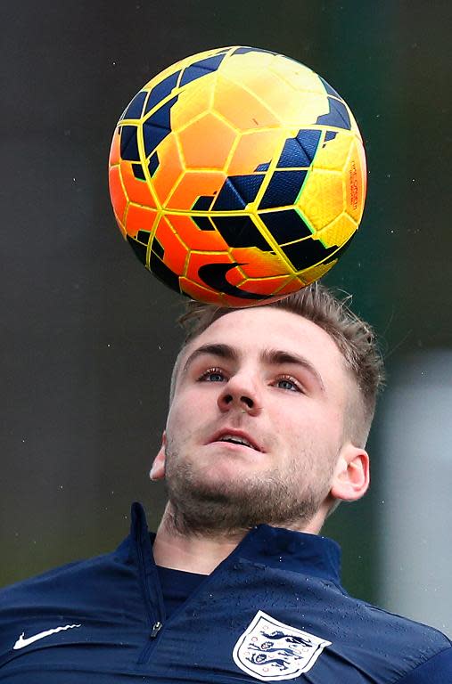 England defender Luke Shaw controls the ball during a training session at Tottenham Hotspur's training complex in Enfield, north London, on March 3, 2014