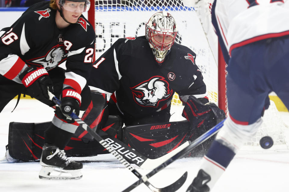 Buffalo Sabres goaltender Ukko-Pekka Luukkonen (1) makes a pad save during the second period of the team's NHL hockey game against the Columbus Blue Jackets on Tuesday, Dec. 19, 2023, in Buffalo, N.Y. (AP Photo/Jeffrey T. Barnes)