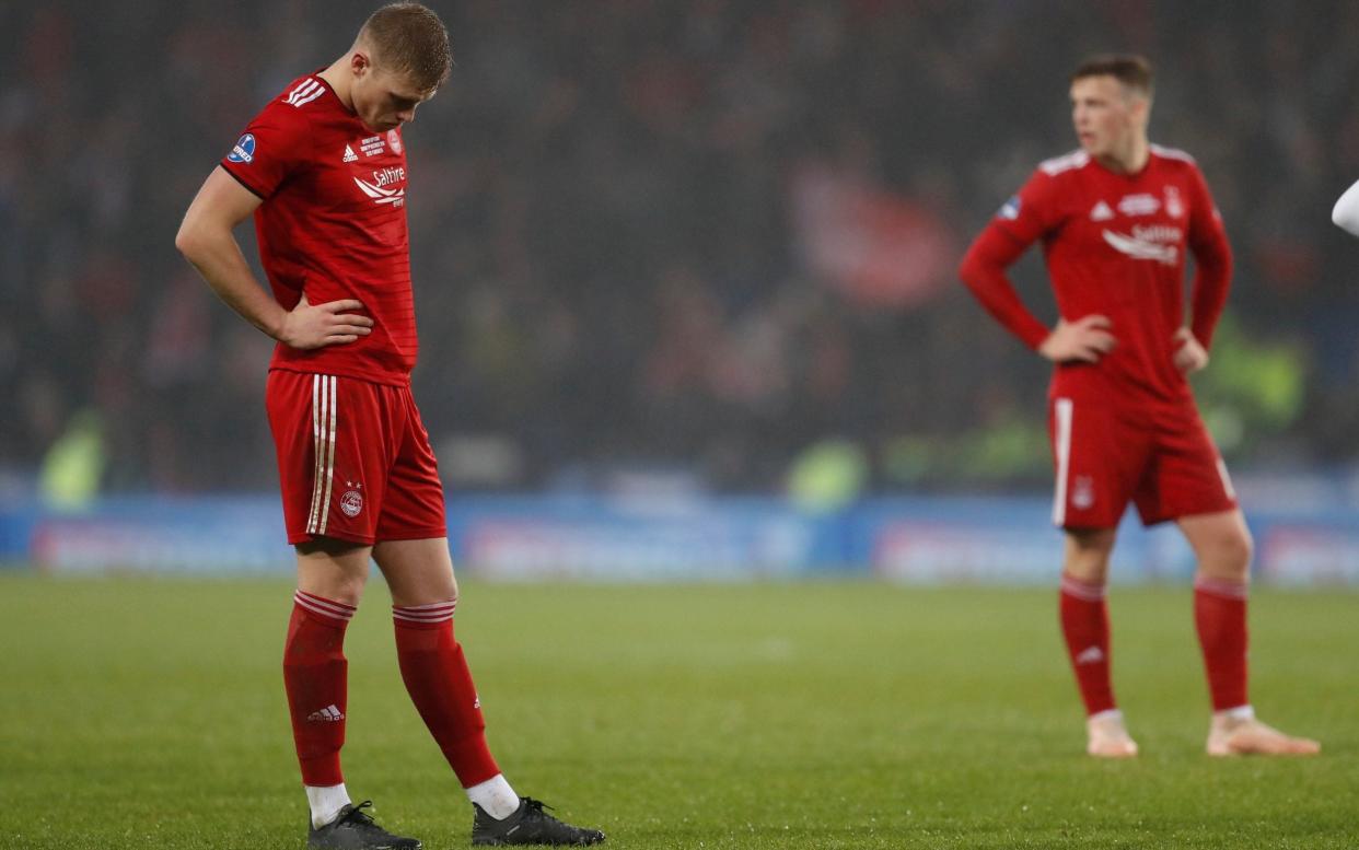 Sam Cosgrove looks dejected - REUTERS