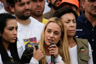 Lilian Tintori (C), wife of jailed Venezuelan opposition leader Leopoldo Lopez, speaks during a rally in support of political prisoners and against Venezuelan President Nicolas Maduro, outside the military prison of Ramo Verde, in Los Teques, Venezuela April 28, 2017. REUTERS/Marco Bello