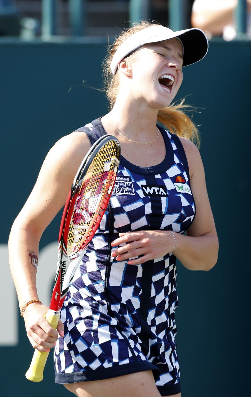 Elina Svitolina, of Ukraine, reacts against Sloane Stephens during the Family Circle Cup tennis tournament in Charleston, S.C., Wednesday, April 2, 2014. Svitolina defeated Stephens 6-4, 6-4. (AP Photo/Mic Smith)