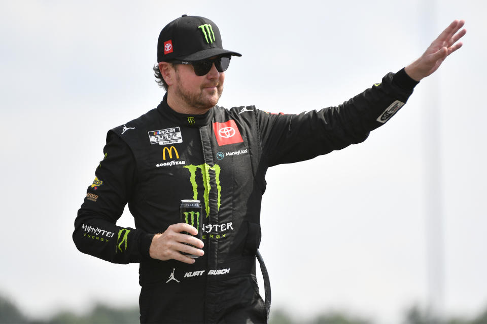 LEBANON, TENNESSEE - JUNE 26: Kurt Busch, driver of the #45 Monster Energy Toyota, waves to fans onstage during driver intros prior to the NASCAR Cup Series Ally 400 at Nashville Superspeedway on June 26, 2022 in Lebanon, Tennessee. (Photo by Logan Riely/Getty Images)