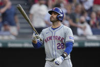 New York Mets' J.D. Martinez flips his bat as he walks back to the dugout after striking out with the bases loaded during the fifth inning of a baseball game against the Cleveland Guardians, Tuesday, May 21, 2024, in Cleveland. (AP Photo/Sue Ogrocki)