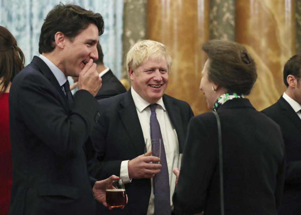 Britain's Princess Anne The Princess Royal, right, talks to NATO delegates from left, Canadian Prime Minister Justin Trudeau and Britain's Prime Minister Boris Johnson, during a reception at Buckingham Palace, in London, as Nato leaders attend to mark 70 years of the alliance, Tuesday Dec. 3, 2019. While NATO leaders are publicly professing unity as they gather for the London summit, several seem to have been caught in an unguarded exchange on camera apparently gossiping about U.S. President Donald Trump’s behaviour. In footage recorded during the Buckingham Palace reception on Tuesday, Canadian Prime Minister Justin Trudeau was seen standing in a huddle with French President Emmanuel Macron, British Prime Minister Boris Johnson, Dutch Prime Minister Mark Rutte and Britain’s Princess Anne. (Yui Mok/Pool via AP)