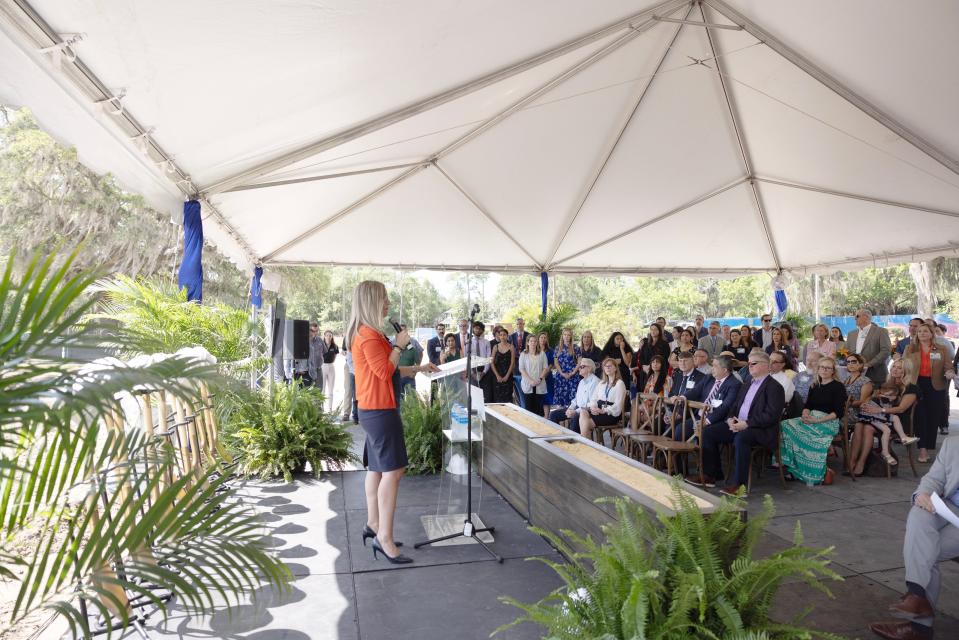 Traci d'Auguste, chief operating officer for UF Health Shands Hospital, speaks Thursday during the groundbreaking ceremony for the new Florida Recovery Center in northwest Gainesville.