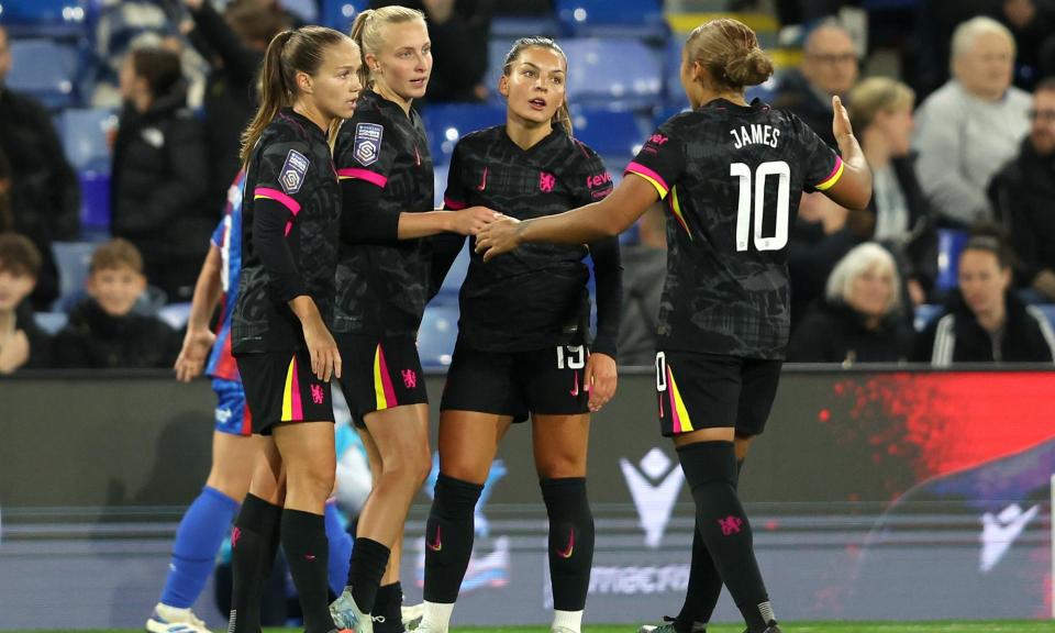 <span>Chelsea’s Aggie Beever-Jones celebrates with teammates after scoring her side’s first goal against Crystal Palace on Friday.</span><span>Photograph: Tom Dulat/The FA/Getty Images</span>