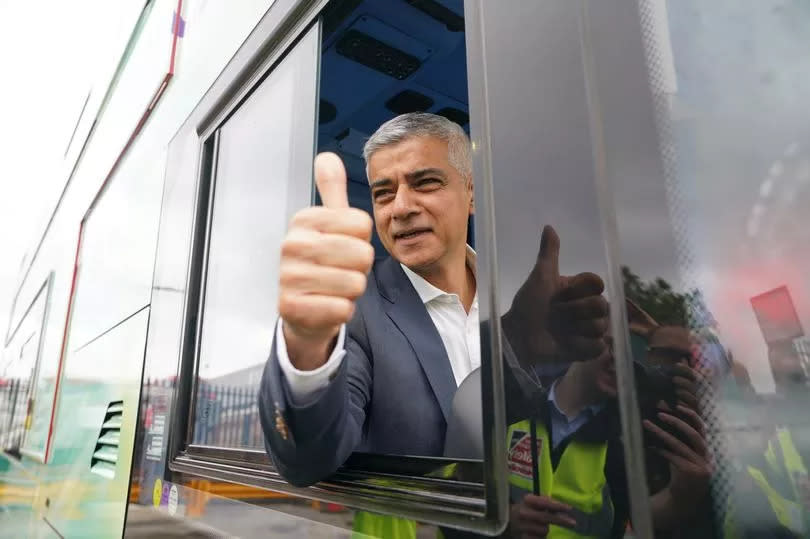 Mayor of London Sadiq Khan giving thumbs up onboard a Transport for London (TfL) low emission bus
