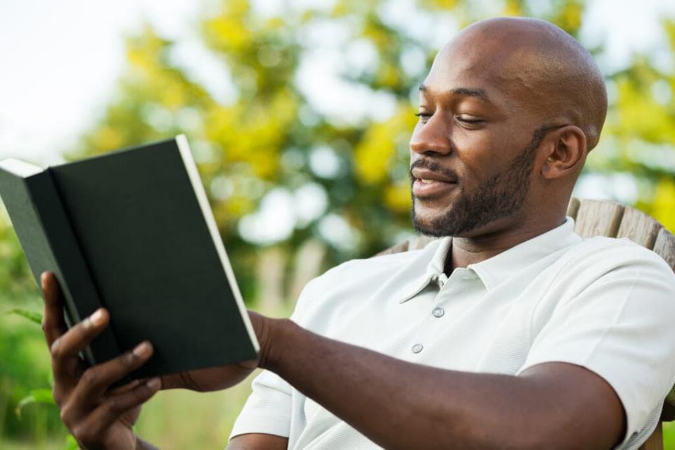 A new book club in Chicago brings Black men together for camaraderie and conversation about art, books, food, culture and various social issues that impact the community. (AdobeStock)