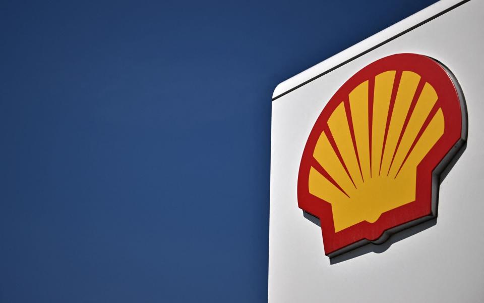 (FILES) In this file photo taken on April 30, 2022 shows the logo of the multinational oil and gas company Shell at a petrol station in Eltham, south east of London. - British energy giant Shell on January 6, 2023 said windfall taxes imposed by the European Union and UK following a surge in profits would cost the group about $2 billion. Shell said the exceptional tax bill, imposed after oil and gas prices surged last year, would be included in its 2022 fourth quarter earnings to be confirmed next month. (Photo by Ben Stansall / AFP) (Photo by BEN STANSALL/AFP via Getty Images) - BEN STANSALL/AFP via Getty Images