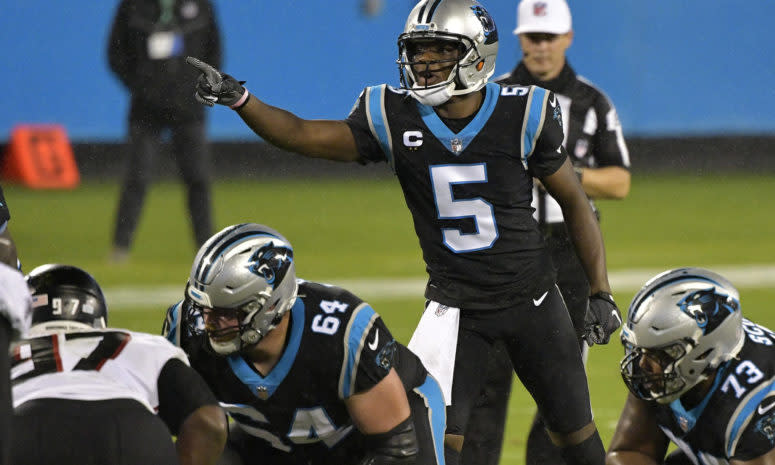 Carolina Panthers QB Teddy Bridgewater makes a call during an NFL game.