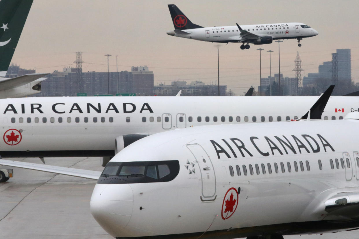 Two Air Canada Boeing 737 MAX 8 aircrafts are seen on the ground at Toronto Pearson International Airport in Toronto, Ontario, Canada, March 13, 2019.  (REUTERS/Chris Helgren)