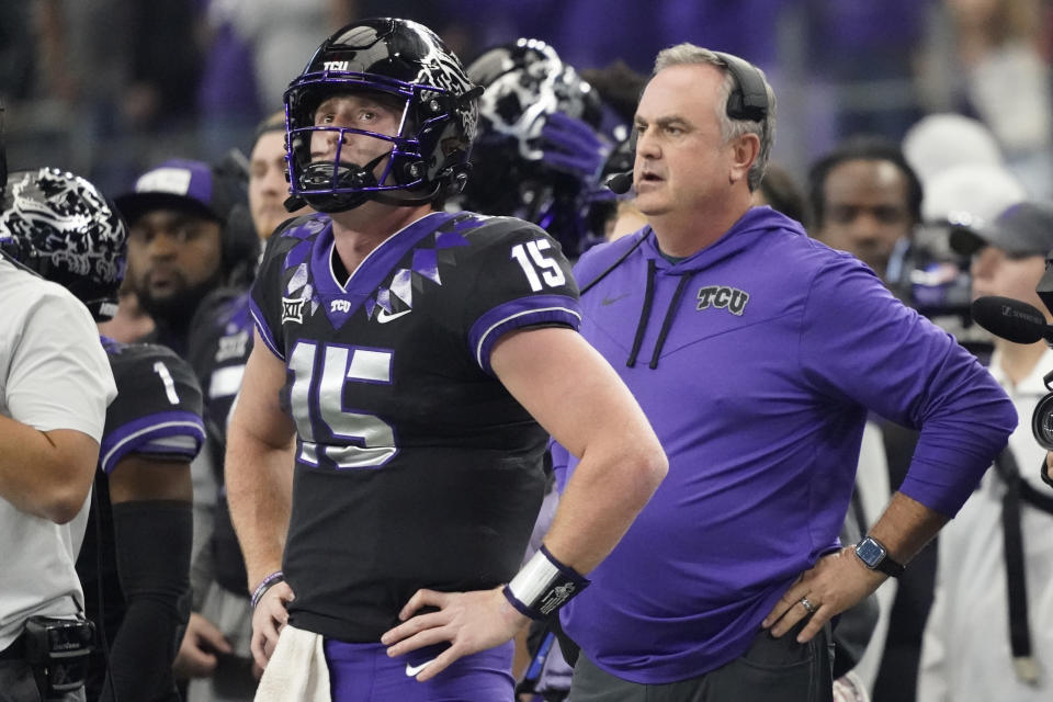 TCU quarterback Max Duggan (15) and head coach Sonny Dykes (right) will have plenty of reason to be upset if their team is left out of the College Football Playoff. (AP Photo/LM Otero)