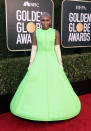 <p>Erivo's neon, scuba gown was the talk of the 2021 Golden Globes. The British stage appeared to float down the red carpet in a green, Valentino Haute Couture dress that appeared to hover a couple of inches above the ground. According to Erivo's stylist, Jason Bolden, the star actually didn't know anything about it before the show. (Getty Images)</p> 