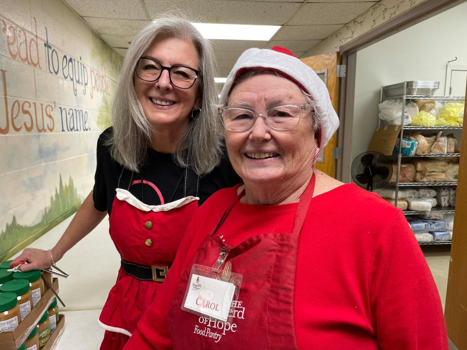 Pantry Director Reneè Stone with volunteer Carol Nanney at Shepherd of Hope Food Pantry at Faith Lutheran Church, 225 Jamestown Blvd. Dec. 4, 2023.