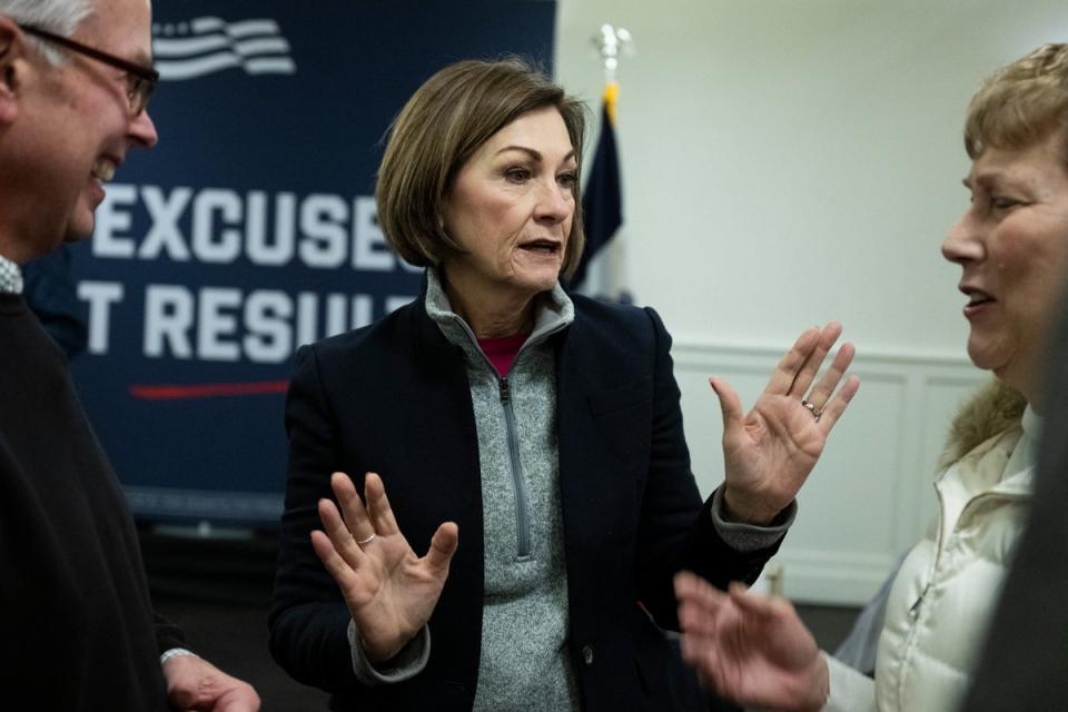 Iowa Governor Kim Reynolds is among state officials that refused to enrol in a new food assistance program this summer. (AFP via Getty Images)