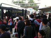 Commuters boarding a free shuttle bus outside Bishan SMRT station. (Yahoo! photo)