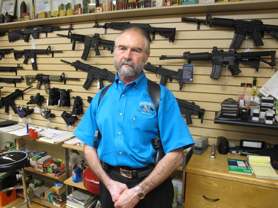 <p> Frank Loane, owner of Pasadena Pawn and Gun, stands in front of a wall of assault rifles at his store in Pasadena, Md., on Thursday, Sept. 26, 2013. Loane, who said he has seen significant boost in business this year as Maryland lawmakers debated and passed a sweeping gun-control bill, won’t be able to sell many of the guns shown behind him in Maryland after Tuesday, when the gun-control law takes effect banning 45 types of assault weapons. Loane also says handgun sales have been up, because customers don’t want to meet a new fingerprinting requirement to buy a handgun on Oct. 1, as well as additional paperwork and a gun safety course. (AP Photo/Brian Witte)</p>