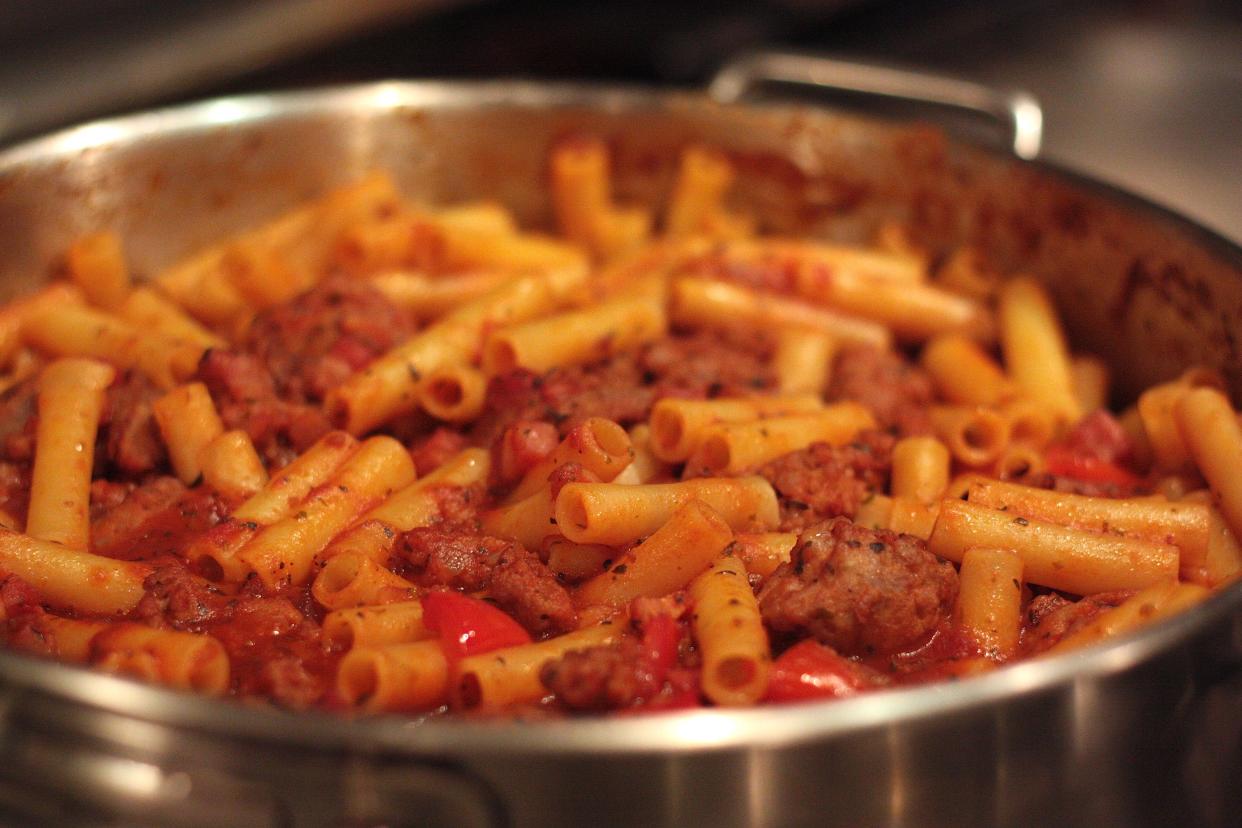 Baked ziti with sausage, pancetta & red pepper.