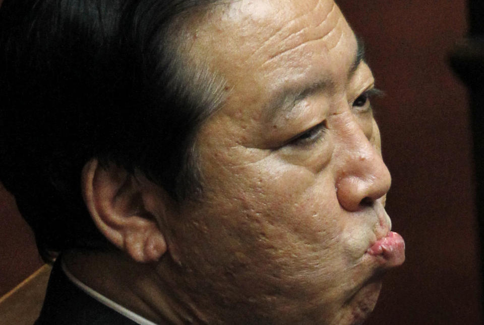 Japanese Prime Minister Yoshihiko Noda reacts during the plenary session of the lower house of Parliament in Tokyo, Tuesday, June 26, 2012. Noda made a final plea for unity on a tax hike vote Tuesday that has divided his ruling party and could weaken his hold on power. Noda told Parliament the sales tax hike and other measures are needed to bolster Japan's economy and reduce public debt. (AP Photo/Koji Sasahara)