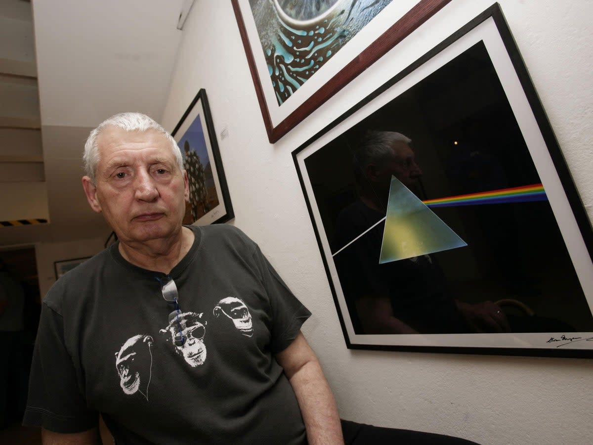 The late Storm Thorgerson with his cover art for ‘Dark Side of the Moon’ (PA)