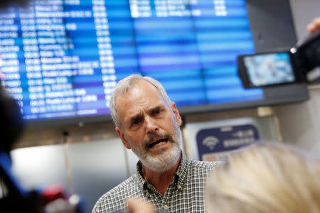 Aid worker Rob Robinson of Christian Friends of Korea talks to the media after his arrival from Pyongyang at Beijing airport, China August 31, 2017. REUTERS/Thomas Peter