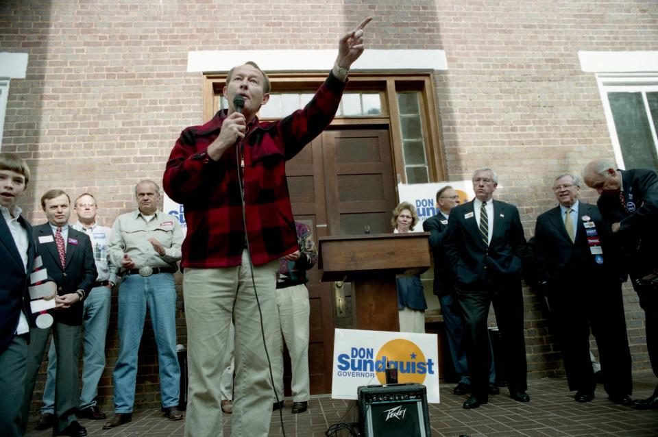 Former Gov. Lamar Alexander, center, asks a crowd to support all Republican candidates during a rally speech at the Jefferson County Courthouse in Dandridge, Tenn., on Nov. 5, 1994. He appeared with several Republican candidates, Don Sundquist, Fred Thompson and Bill Frist.