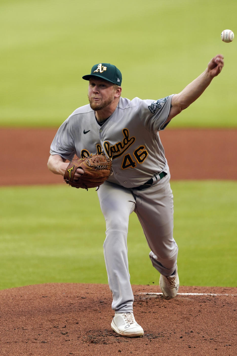 Oakland Athletics pitcher Jared Koenig delivers in the first inning of the team's baseball game against the Atlanta Braves on Wednesday, June 8, 2022, in Atlanta. Koenig was making his debut in the majors. (AP Photo/John Bazemore)