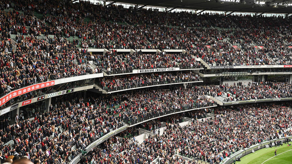 Fans, pictured here watching on during Collingwood's clash with Essendon at the MCG.