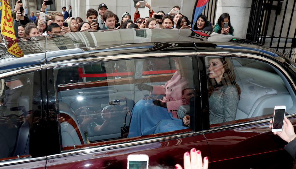 The Queen and the Duchess of Cambridge arrive at King’s College London together, even sharing a blanket in the car [Photo: Getty]
