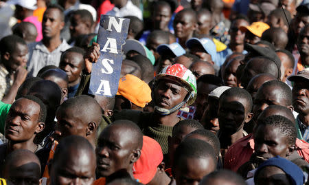 Supporters of Kenyan opposition National Super Alliance (NASA) coalition attend a rally during which Raila Odinga was announced as their presidential candidate for the 2017 general elections at the Uhuru Park grounds, in Nairobi, Kenya, April 27, 2017. REUTERS/Thomas Mukoy