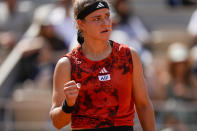 Karolina Muchova of the Czech Republic clenches her fist after scoring a point against Aryna Sabalenka of Belarus during their semifinal match of the French Open tennis tournament at the Roland Garros stadium in Paris, Thursday, June 8, 2023. (AP Photo/Thibault Camus)