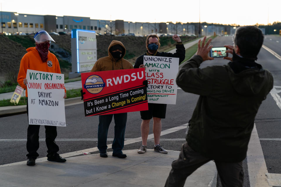 A supporter of the RWDSU unionization effort with other supporters outside the Amazon fulfillment warehouse in Bessemer, Ala. (Elijah Nouvelage/Getty Images)