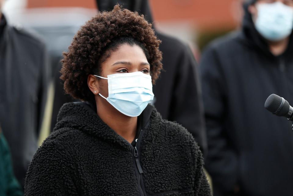 Shaneice Brown talks about her role in creating an anti-violence billboard campaign Thursday, Jan. 20, 2022, during a press conference outside the Marion County Child Advocacy Center on Keystone Avenue in Indianapolis. Twenty-five billboards will be on display for four weeks, displaying messages that aim to combat stigmas surrounding violence in Indianapolis.